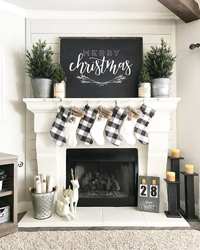 Lovely Black and White Rustic Christmas Mantel that would pair well with a galvanized christmas tree collar