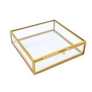 elegant and delicate glass jewelry box with gold frame