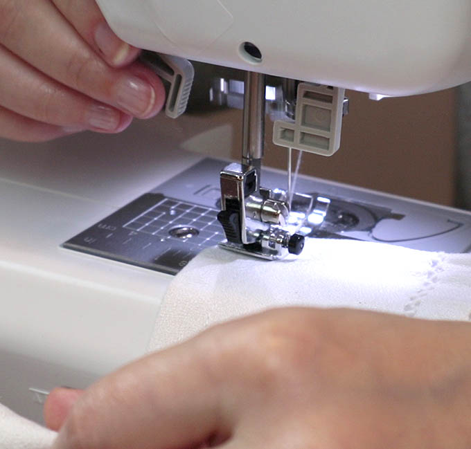 Sew one line of stitches to create a channel for your dowel.