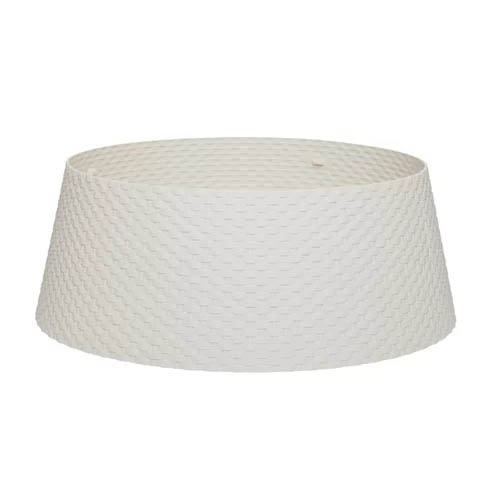 white plastic tree collar that closes with magnets