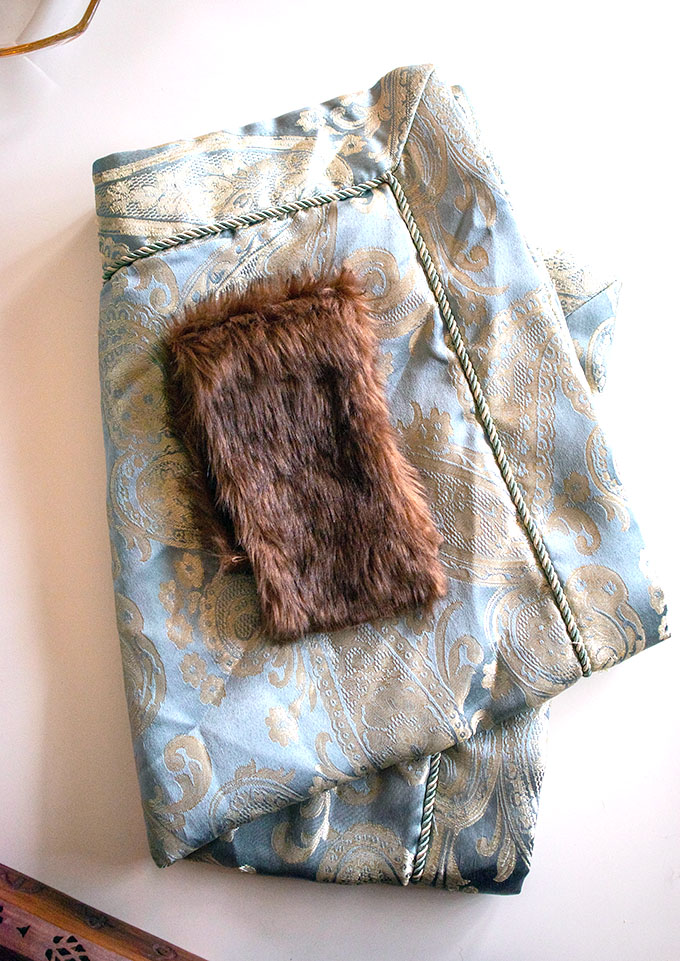 Fabric and faux fur used to make a DIY christmas stocking