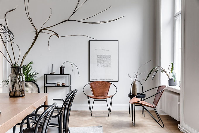 scandinavian interiors are famous for being clean and airy feeling, like this dining room