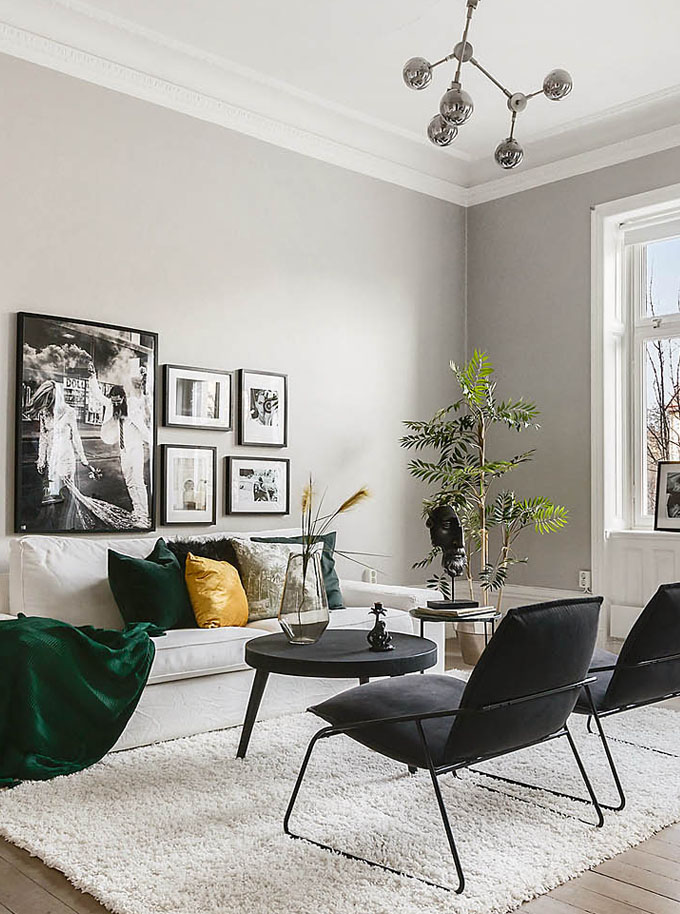 scandinavian interior designers don't overdo it when it comes to artwork - gallery walls are usually more on the restrained side