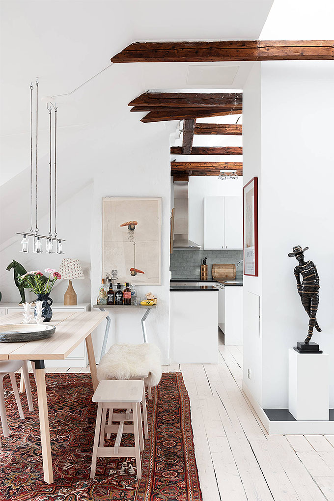 a clever demonstration of how to combine different types of wood in a scandinavian interior