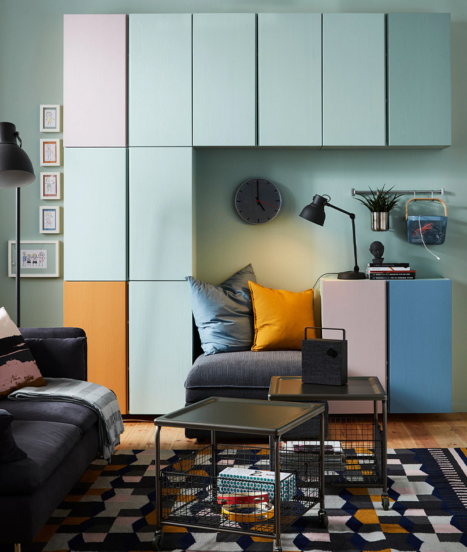 painted ivar units hung on the wall to create a contemporary storage system