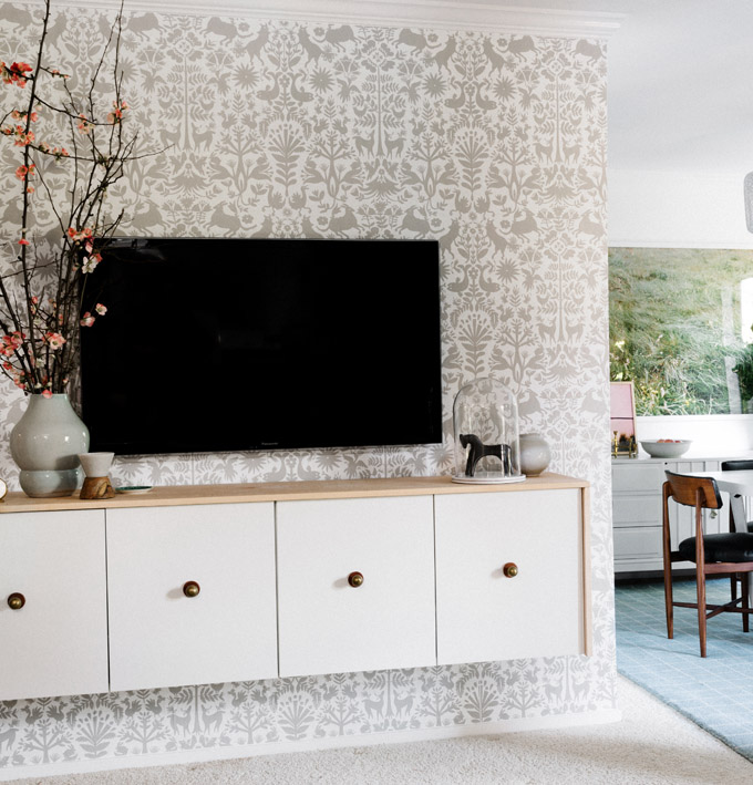 wallpaper is a very effective and clever way to creat a fun accent wall behind your tv