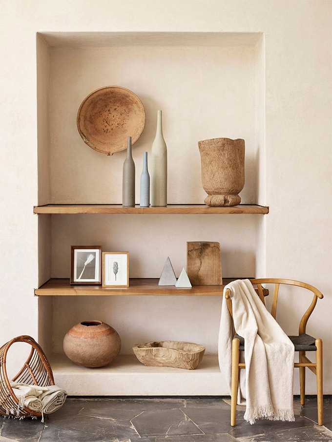 a curated selection of items displayed in a warm neutral room