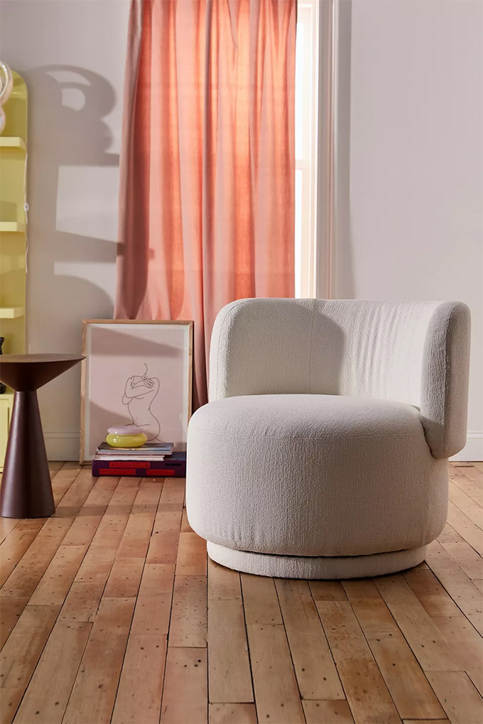 white rounded accent chair