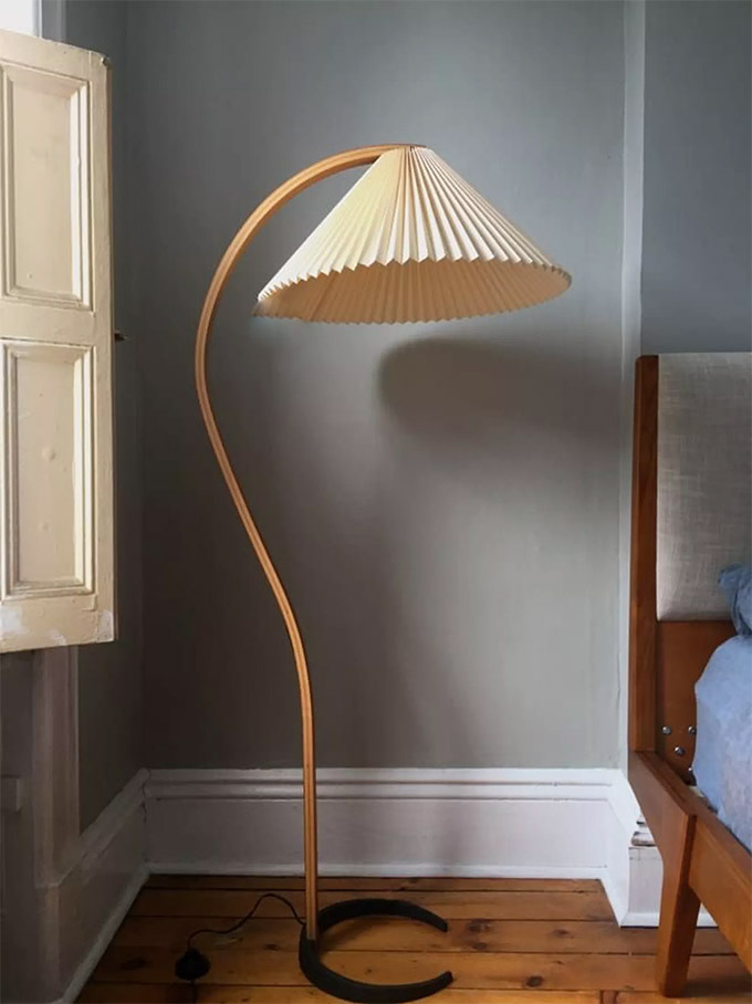 the Mads Caprani bentwood floor lamp is a postmodern design favorite