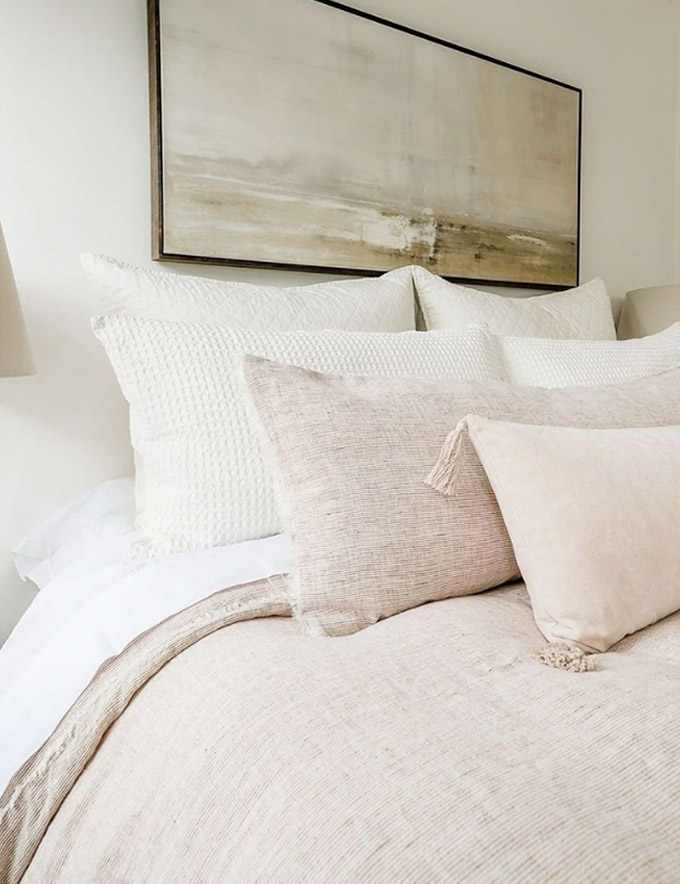light blush pinks, oatmeals and off whites are a beautiful throw pillow combination idea