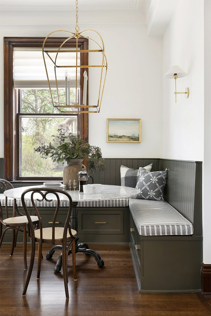 modern traditional breakfast nook with wood and brass accents