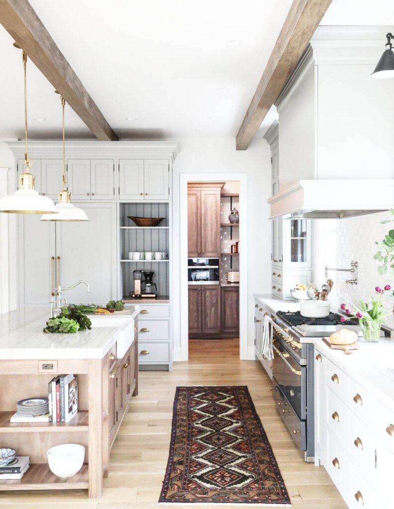 great way to make a budget kitchen look more expensive is to add a nice rug