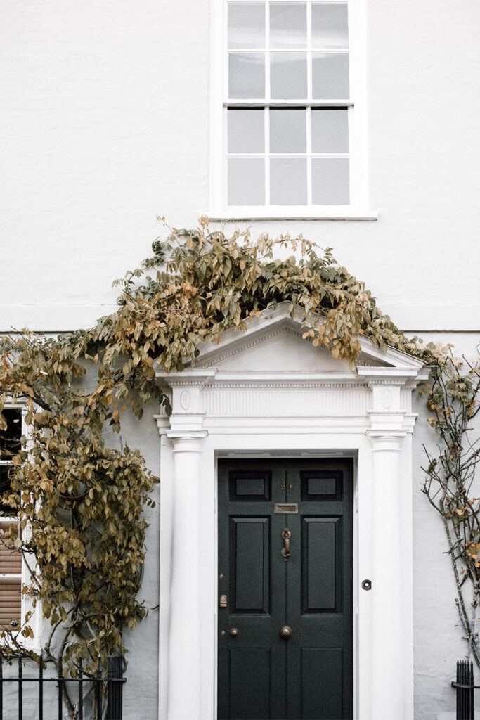 white house with black door