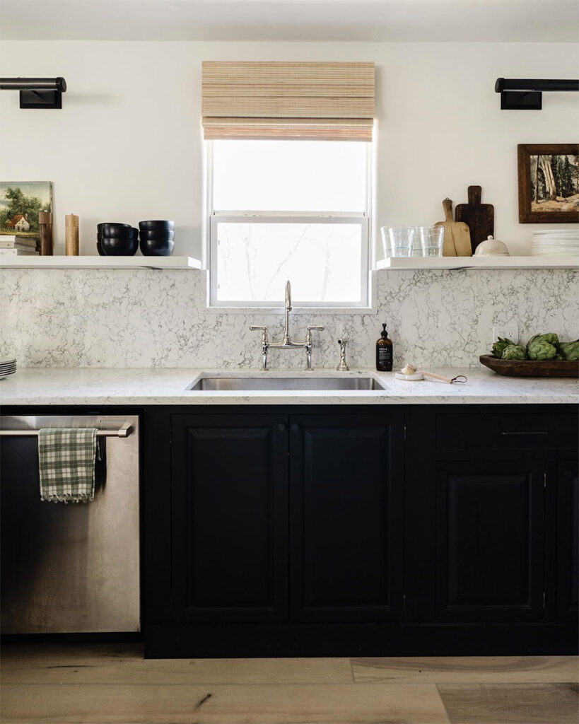 lower kitchen cabinets painted in tricorn black