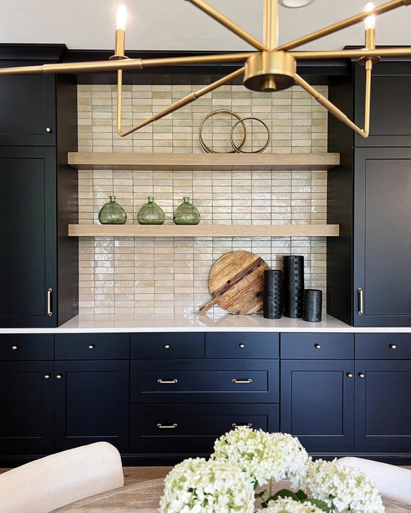 dark tricorn black bar and kitchen area with beige subway tiles