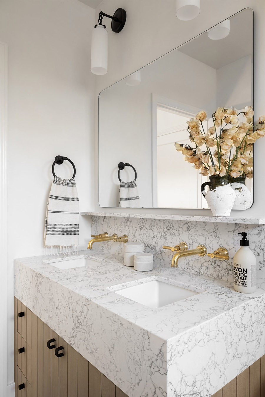 mixed metals in a small bathroom