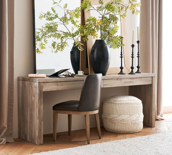 OFFICE AREA WITH WOVEN ROUND POUF OTTOMAN AS DECOR UNDER DESK