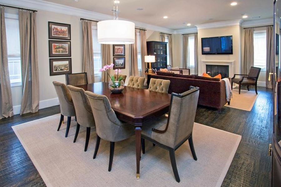 Traditional dining space, open floor plan, with tans and browns, walls painted Machester Tan by Benjamin Moore