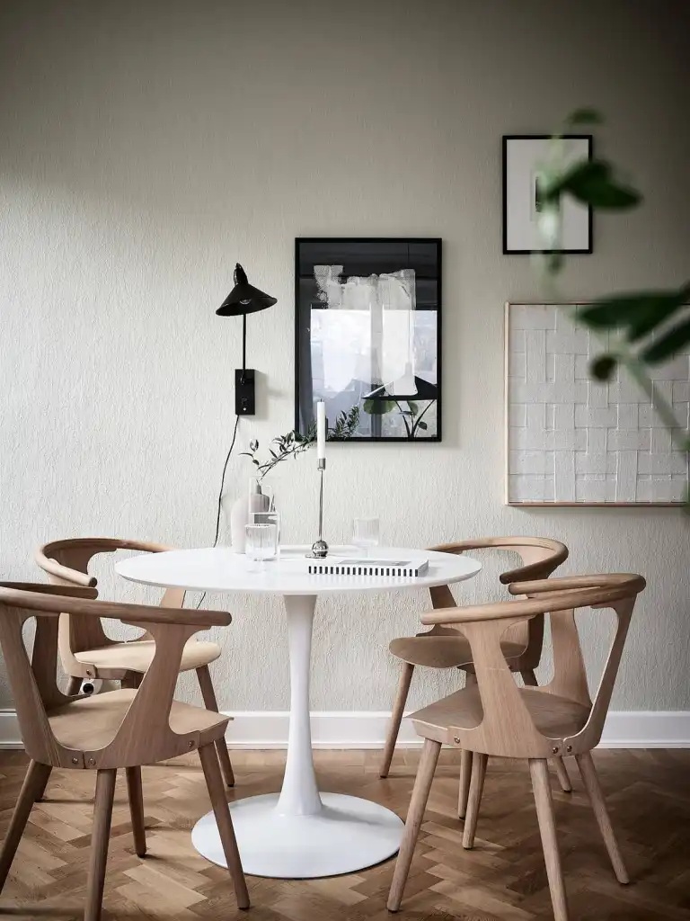 ikea docksta table used alongside statement dining chairs