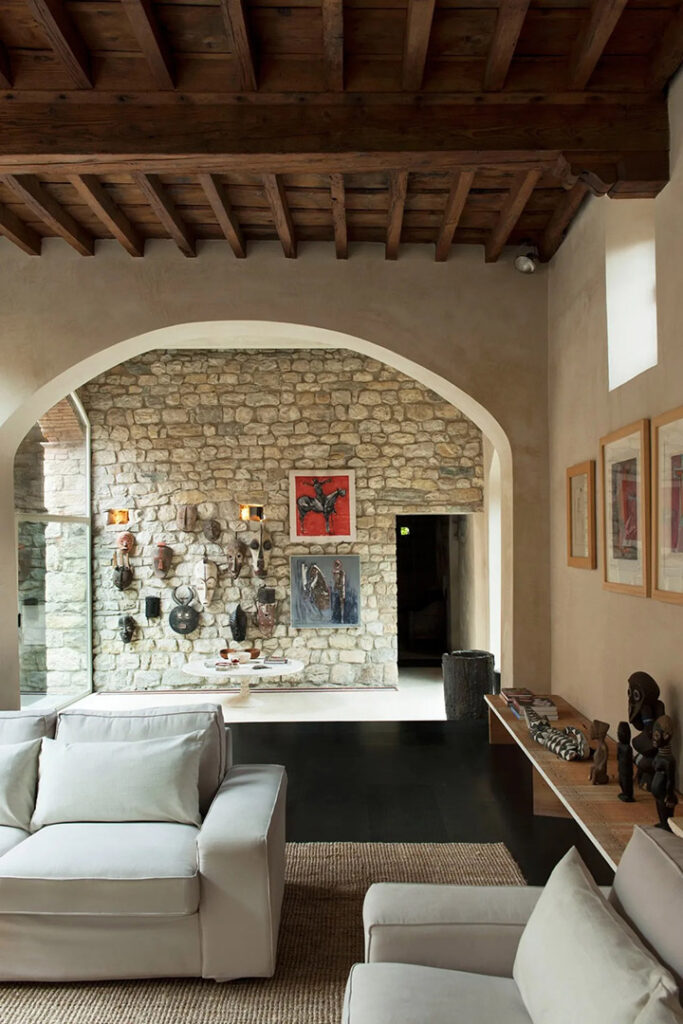 affordable ikea sofas used in a twelfth-century tower in Italy
